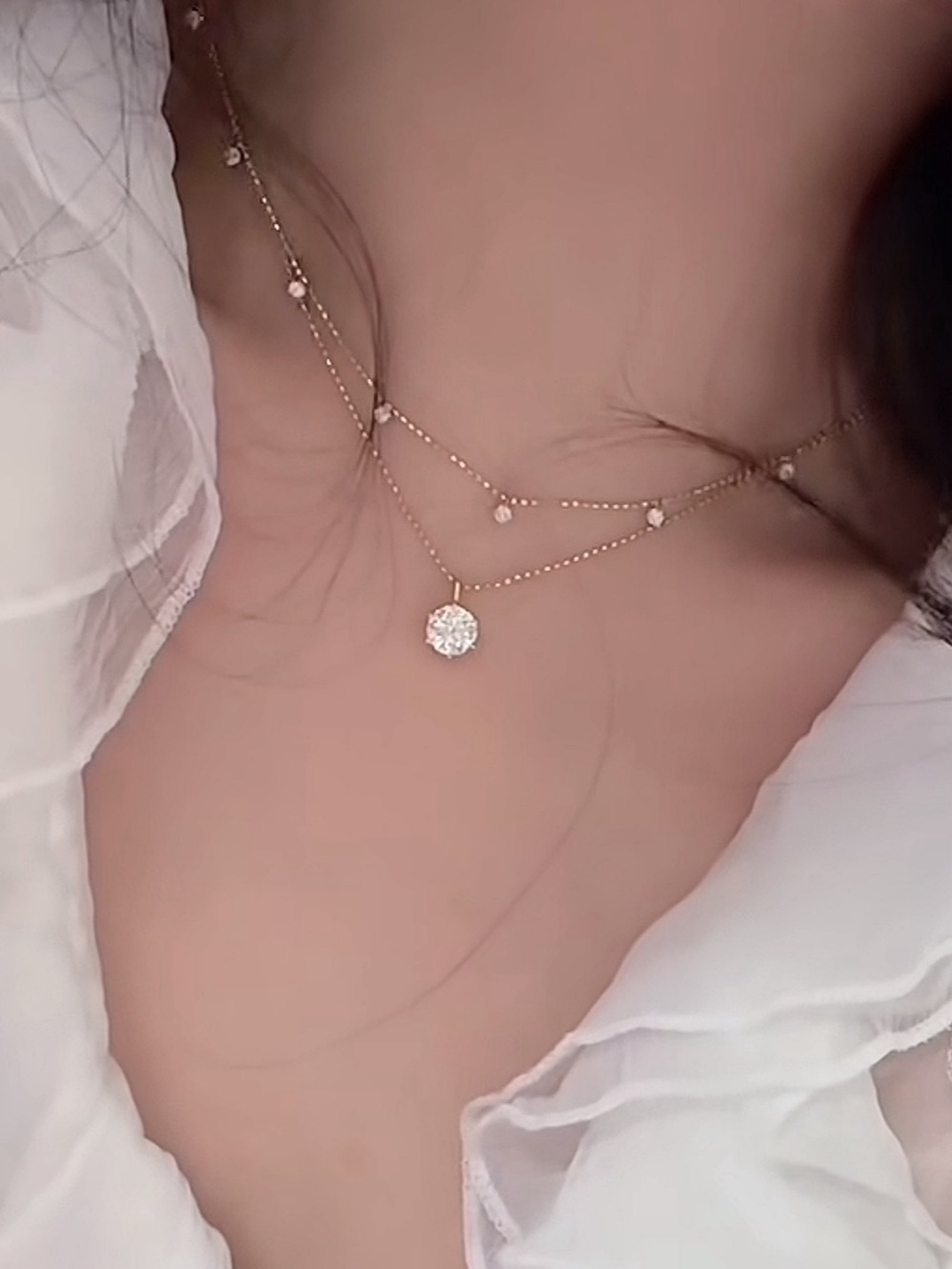 18K gold diamond necklace.